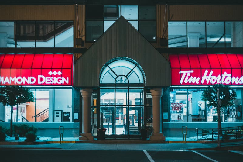 Jet's pizza team members working together in a vibrant kitchen environment